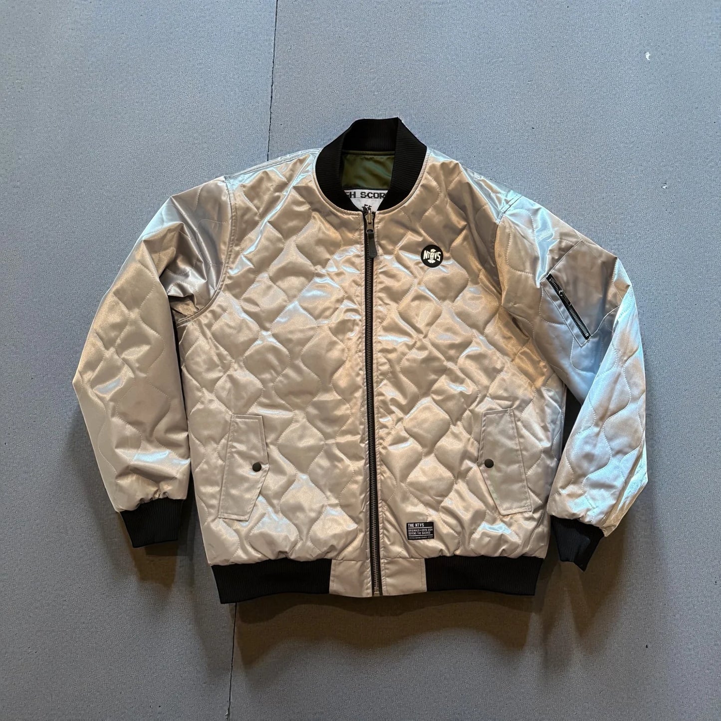 THE TREATY ENFORCER REVERSIBLE UNISEX BOMBER JACKET - GREEN/SILVER